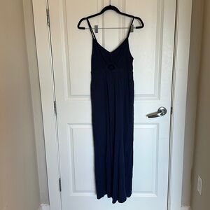 Navy peep front jumpsuit with pockets adjustable straps sz m